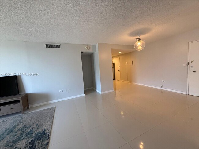 Building Photo - 5555 Collins Ave
