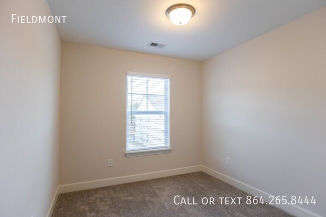 Building Photo - Like-New Townhome with a Fence & Garage!