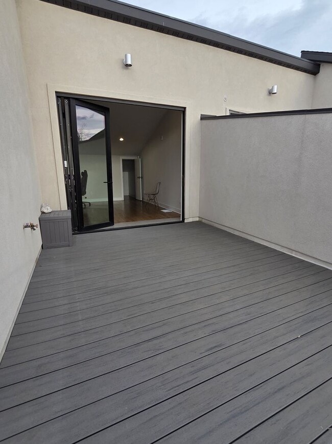 Building Photo - STUNNING 4-LEVEL TOWNHOME IN HIGHLANDS WITH SAUNA, 2-CAR GARAGE + AMAZING ROOFTOP DECK!