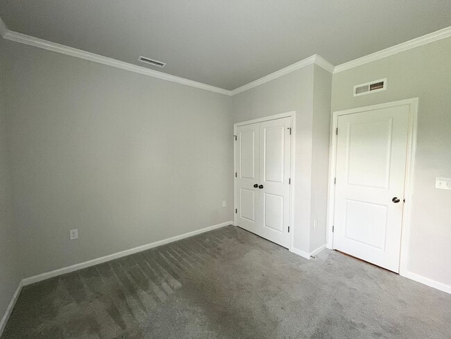 Building Photo - Newly Built 4BD, 3.5BA Zebulon Home with a First Floor Bedroom and Screened Patio in an HOA Commu...