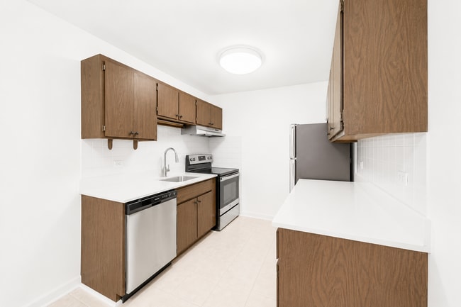 Building Photo - Spacious Rehabbed 1-Bedroom at The Vine | Private Balcony + Parking