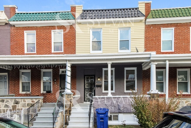 Building Photo - Welcome to this charming abode.