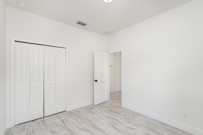 Building Photo - BRAND NEW! 4/2 PALM BAY!