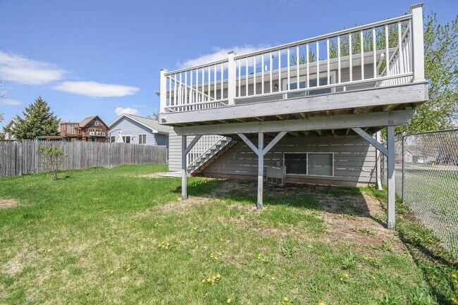 Building Photo - Updated 3BR Split-Level Home with Huge Deck, Fenced Yard & 2-Car Garage Near I-29!
