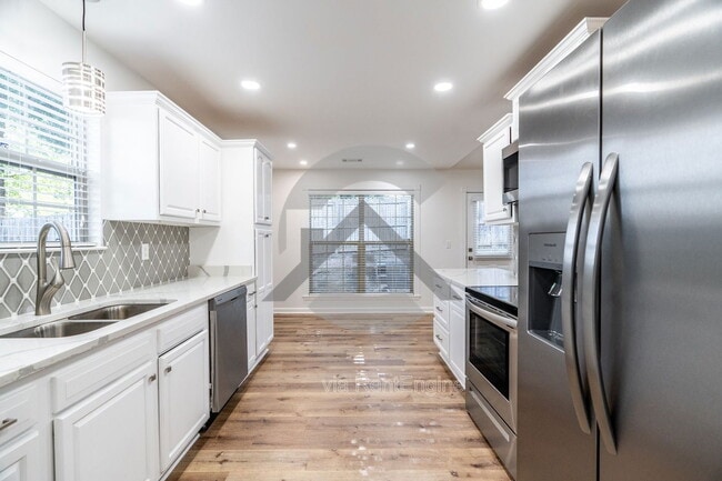 Building Photo - 202 Wild Ivy Cove