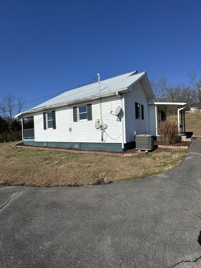 Side view along driveway - 124 Harrington Hollow Rd