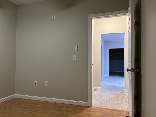 Bedroom #2 into hallway back door - 53 Bridge St