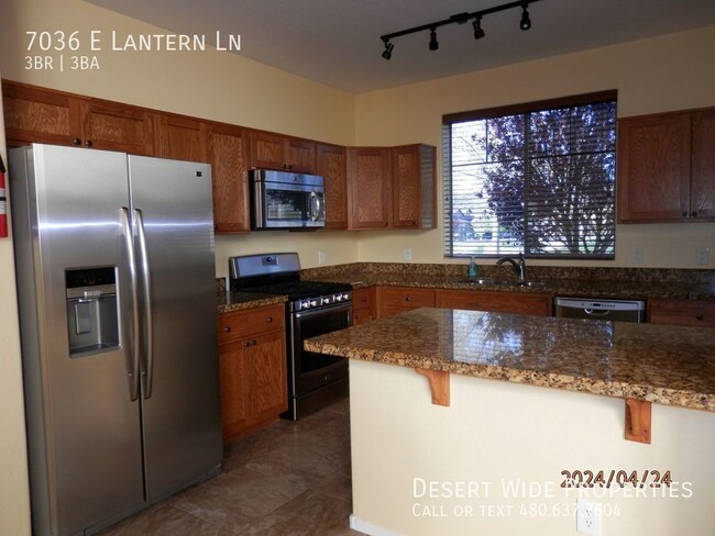Building Photo - 7036 E Lantern Lane East