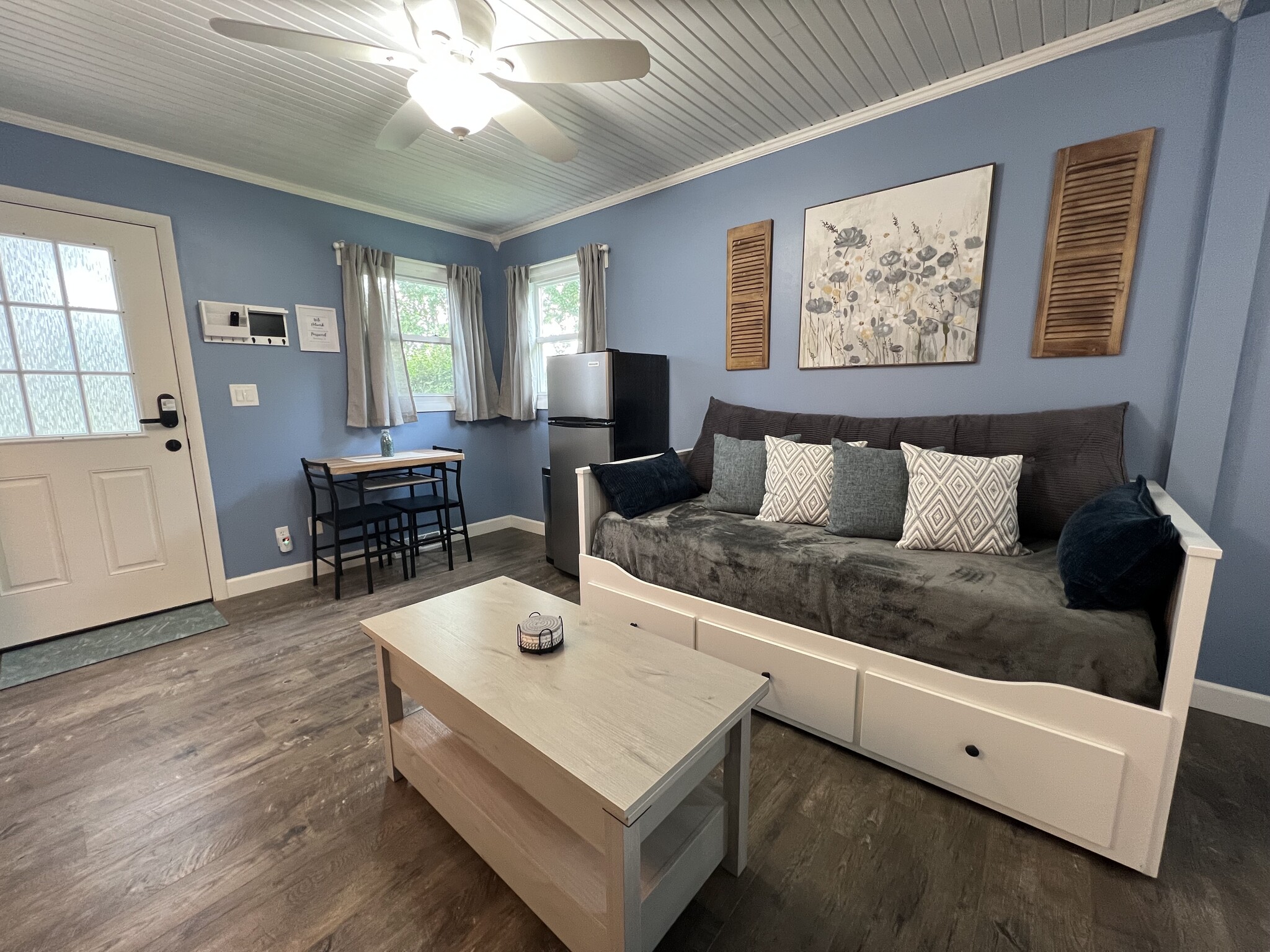 The couch pulls out into another large bed if needed. Also contains 3 deep drawers for storage. - 908 Lake Rd