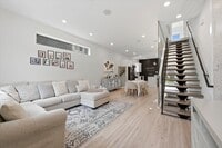 Building Photo - Detached Luxury 4BR/3B Retreat with Skyline Rooftop Deck, Wet Bars, Driveway & Massive Yard