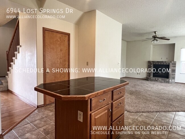 Building Photo - 6944 Lost Springs Dr
