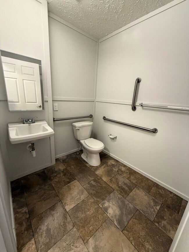 Building Photo - 2-Bed Mobile Home | Water, Trash & Lawn Care Included!