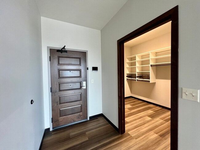 Walk-in Coat Closet - Brennan Properties of Minnesota LLC
