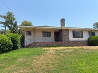 Building Photo - Charming 3-bedroom, 2-bathroom home is nes...