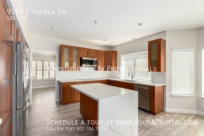 Building Photo - 9159 E Topeka Dr