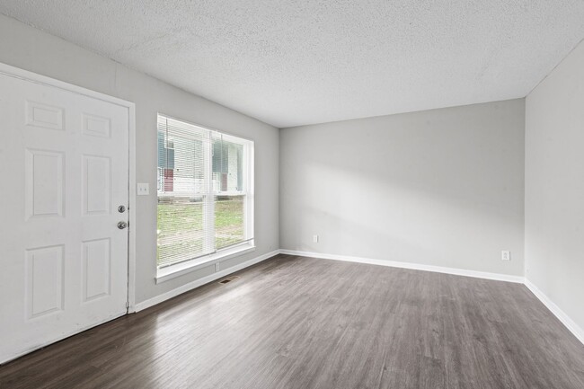 Building Photo - Summer Special! Spacious 3BR Townhome with New Upgrades + $250 Off First Month’s Rent