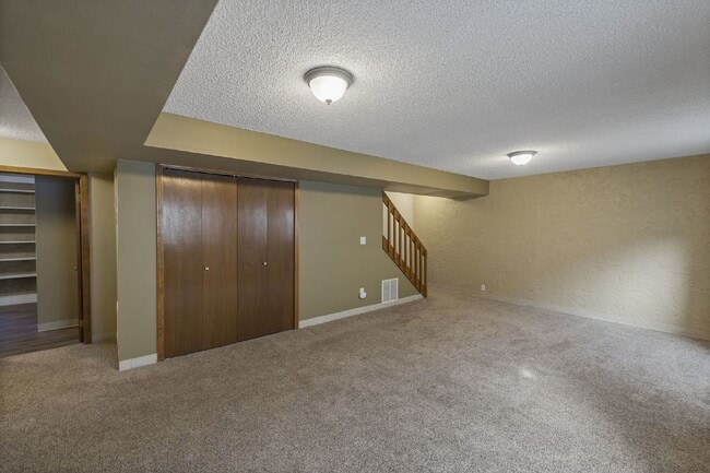 Building Photo - Spacious 4-Bedroom Home with Finished Basement, Large Deck & 2-Car Garage