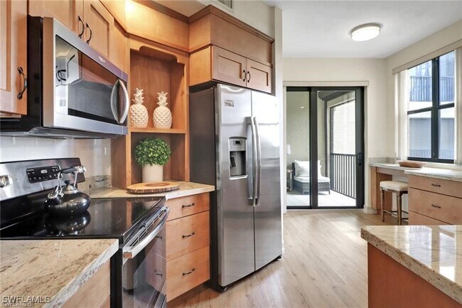 Building Photo - 7008 Pelican Bay Blvd