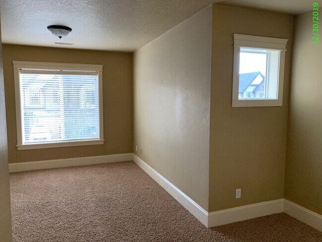 Building Photo - COMING SOON! GORGEOUS Townhome...  LOCATION , LOCATION near Peace Health Hospital