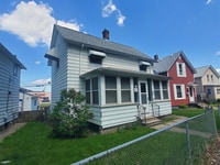 Building Photo - Comfy East Moline Home With Garage and Basement Space