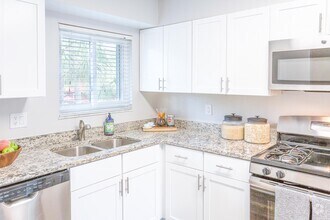 Kitchen (cabinets & appliances vary) - Westwood Suites