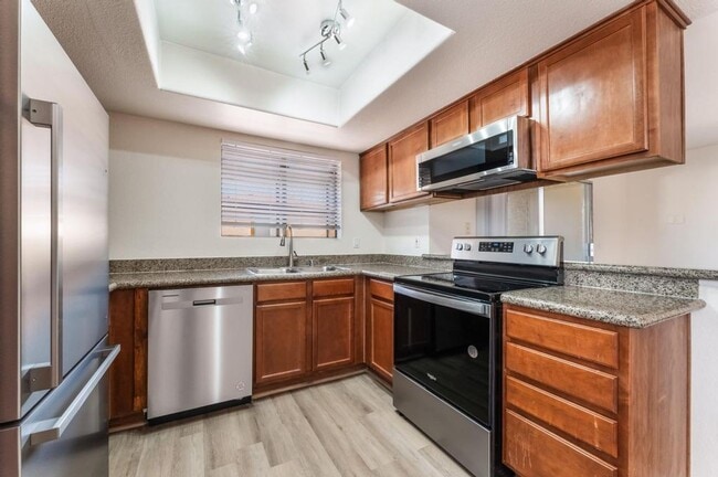 Building Photo - This beautifully renovated 2-bedroom, 2-bath condo is ready for immediate move-in!