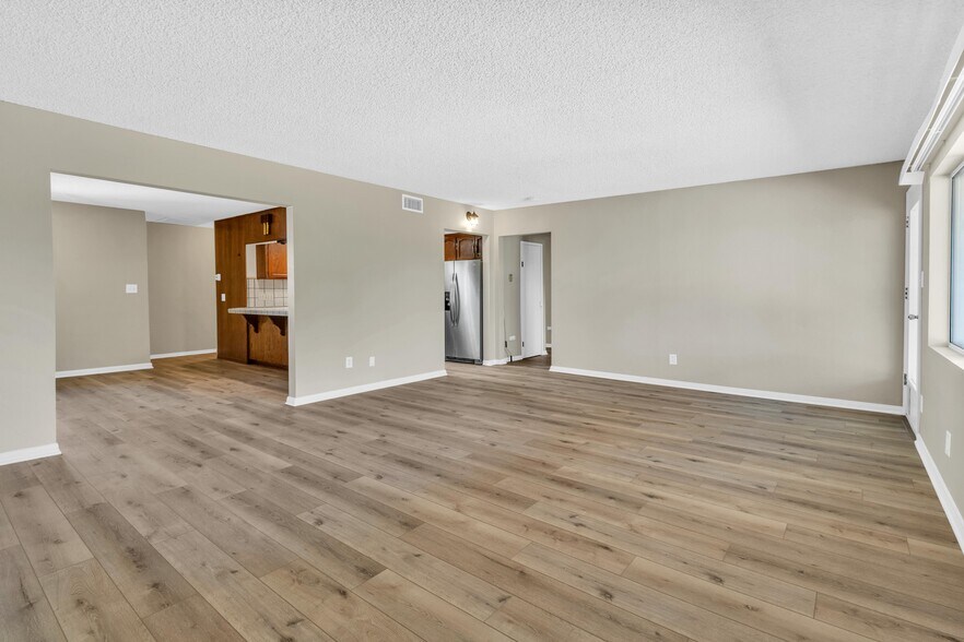 Family Room- View Back to Dining Room - 3210 Geronimo Ave
