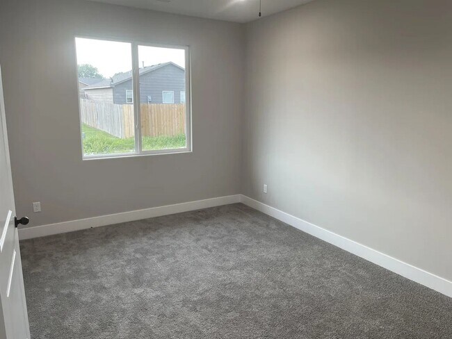 Building Photo - Single family slab home with three car garage. This home is 4 bedrooms, three bathrooms open floo...