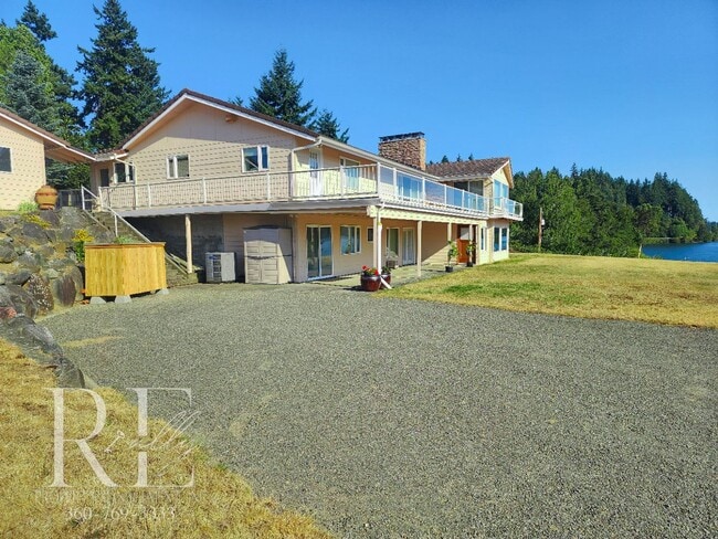 Building Photo - Waterfront Views & Peaceful Living – 2BR w...