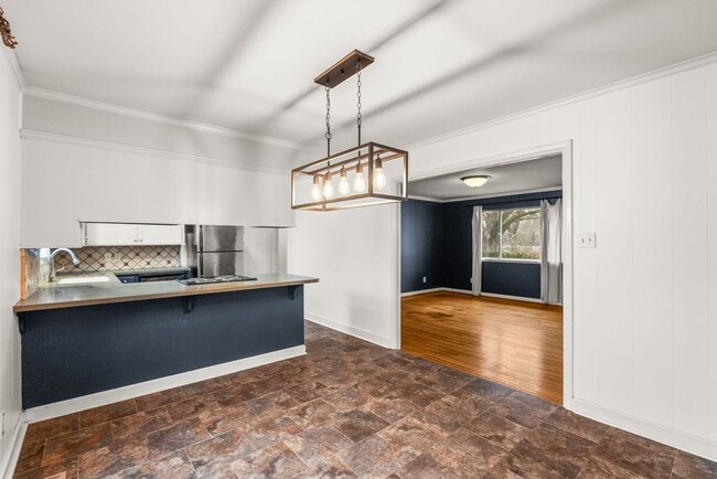 Building Photo - Updated 3BR/2BA Brick Home with Hardwood Floors & Large Yard