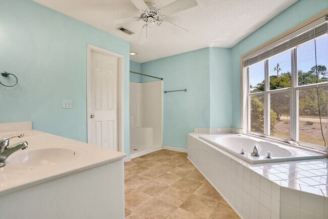 Building Photo - Furnished! Breezewood ground floor unit, Open floor plan, fire place, patio, large closets, wood ...