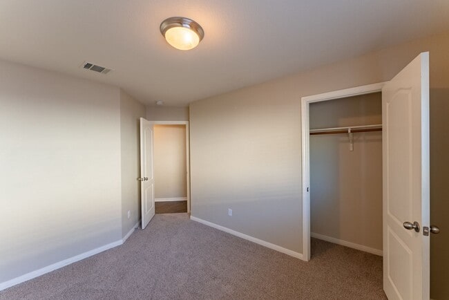 Building Photo - Charming Brick Home with Open Floorplan, Vaulted Ceilings, and Luxurious Amenities—Perfect for An...