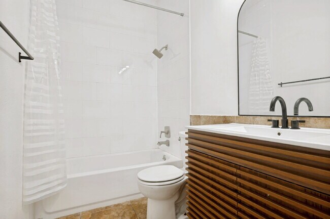 Building Photo - Spacious Dallas Condo with Unbeatable Storage, Private Patio & Carport