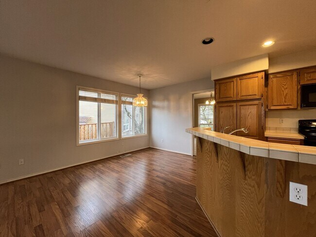 Building Photo - Elegant Home Offering Open Living Spaces, Spacious Primary Suite, and Nature-Inspired Yard