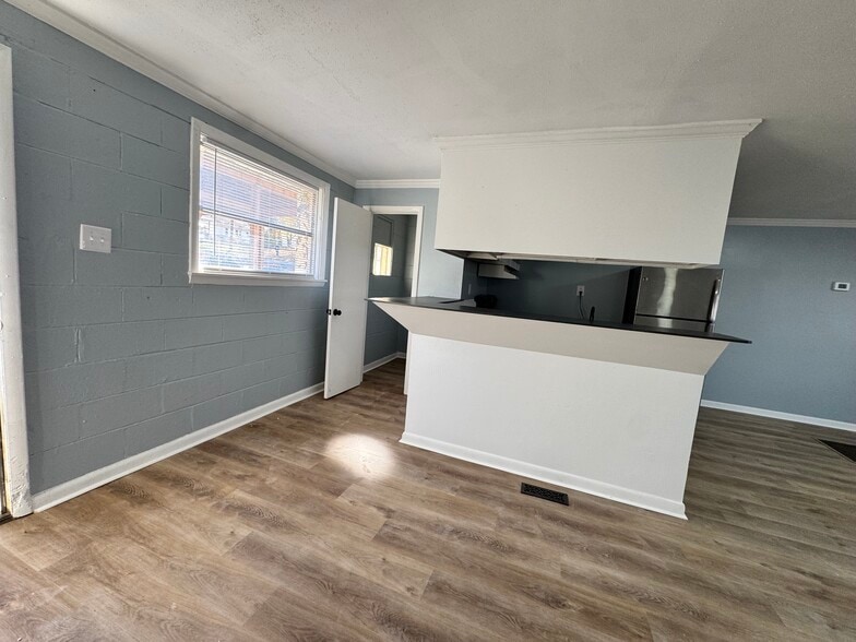 Kitchen into half bath - 105 24th St