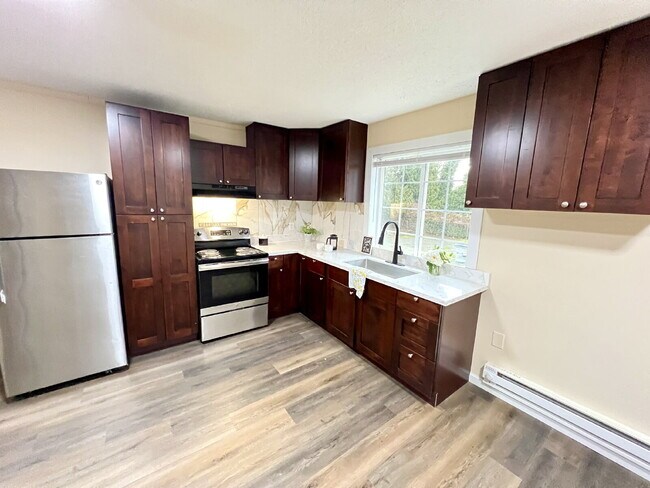 Building Photo - Elevated 3-Bedroom Home with Secure Garage & Cozy Living Space