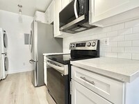 Building Photo - 1849 S Bentley Ave