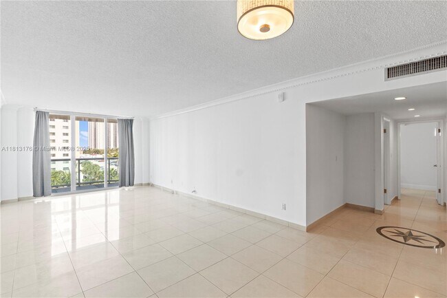 Building Photo - 19390 Collins Ave