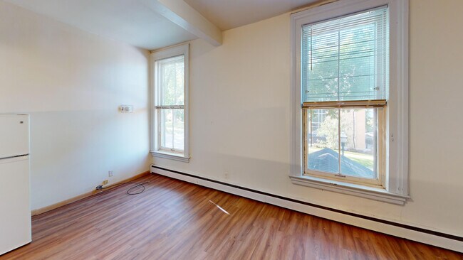Living Room - The Badger Den Apartments on Gilman