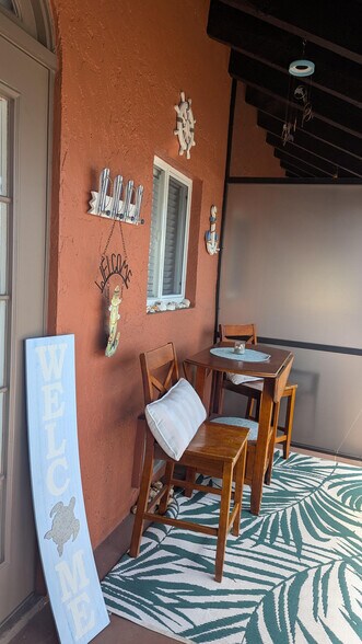 Building Photo - 25000 Tamiami Trl E