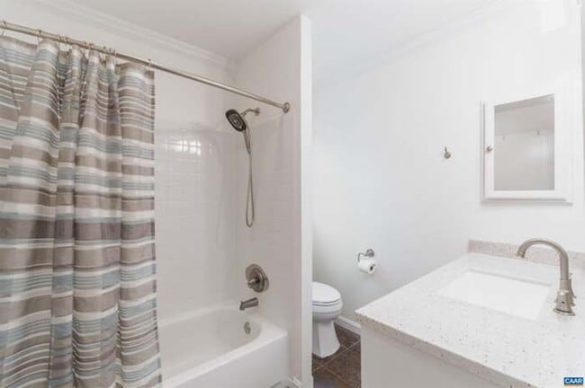 Building Photo - 3BR End-Unit Townhome with Outdoor Oasis –...