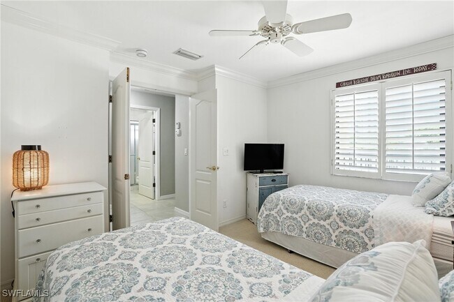 Building Photo - 7032 Pelican Bay Blvd