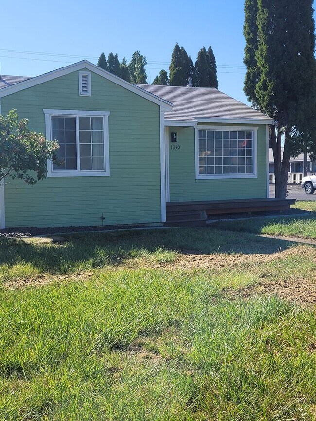 Building Photo - Free May rent with 1 Year Lease - Fully Remodeled with Garage & Yard Care Included