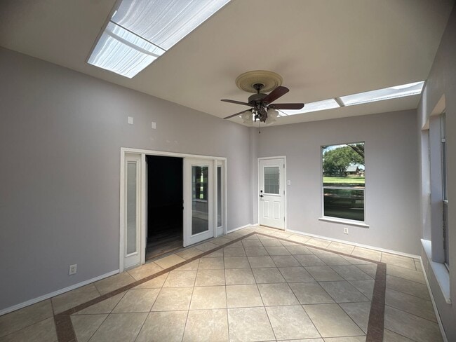 Building Photo - Two-story, four-bedroom, three-bathroom ho...