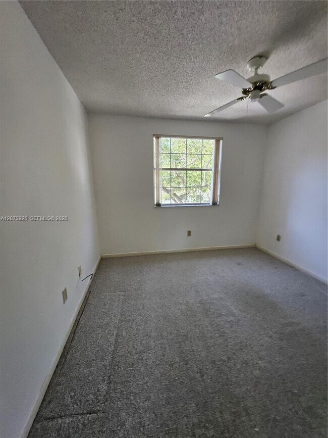 Building Photo - 9840 NW 9th Ct