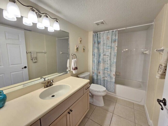 Building Photo - Seaside Serenity Awaits: Spacious 3-Bedroo...