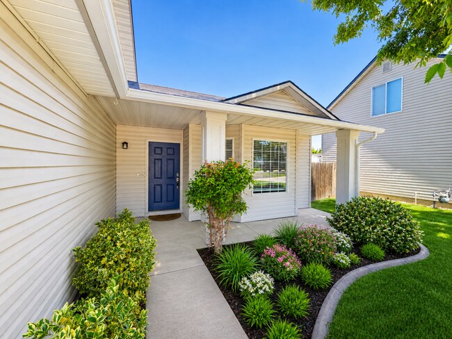 Building Photo - Spacious Home with 3-Car Garage, Two Living Areas & Covered Patio