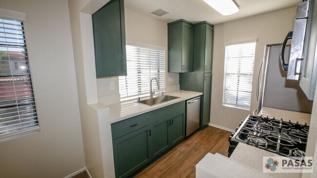 Building Photo - Bright Upgraded Condo w/ Quartz Kitchen, Covered Parking, Pool & Spa