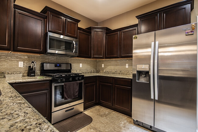 Building Photo - Charming Elegance Meets Modern Comfort in ...