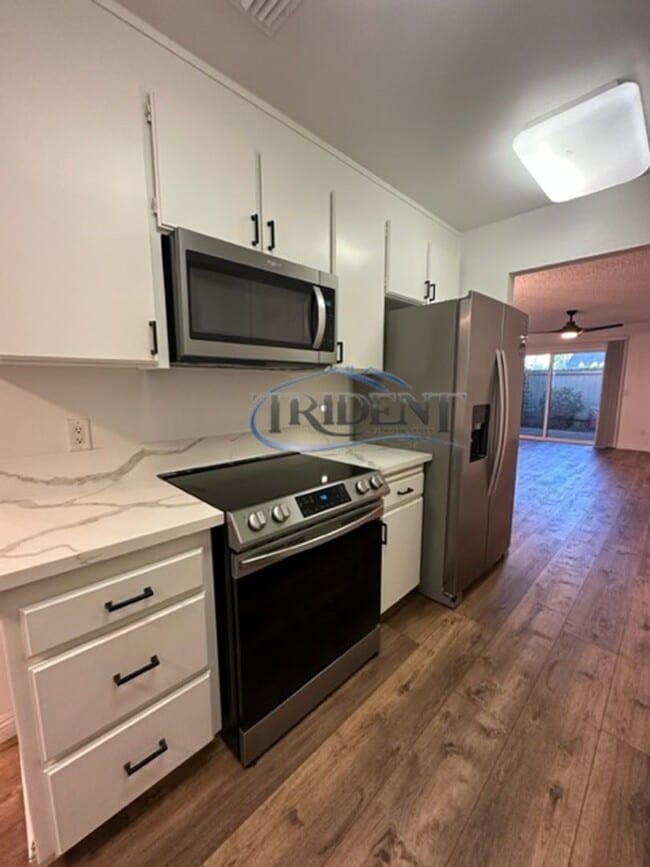 Building Photo - 3 bedroom, 2 ½ bath townhouse, located in The Grove gated community